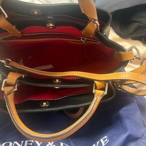 Like new still have the tags comes with dust bag